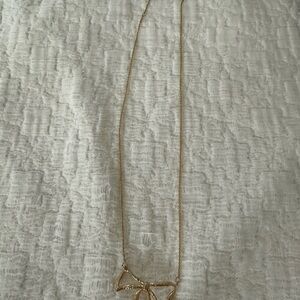 INTERMIX Gold plated Minimalist Necklace with Dainty Chain and edgy bow Pendant